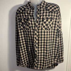This is a Courage Clothing Company Button down long sleeved shirt in size Large.